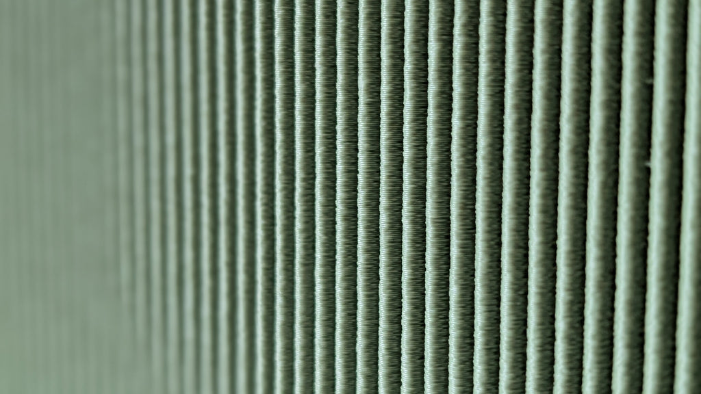 Close-up macro showing the fine ribbed 3D-printed texture of the Niza Tissue Box