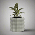 Rivo planter with a soft flowing water-inspired texture, 3D printed from plant-based PLA in Australia