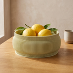 Capri Plate styled in Matcha Green — fresh lemons on an oak table